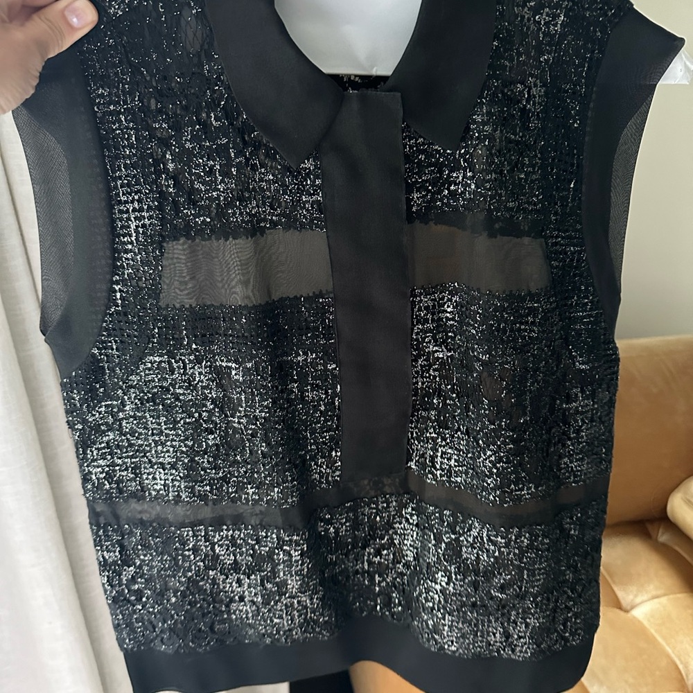 Rebecca Taylor black metal top. Size 0. Excellent conditions.